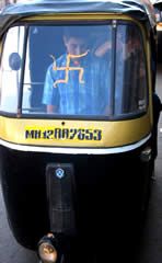 Swastika painted onto the windscreen of an  auto-rickshaw in India